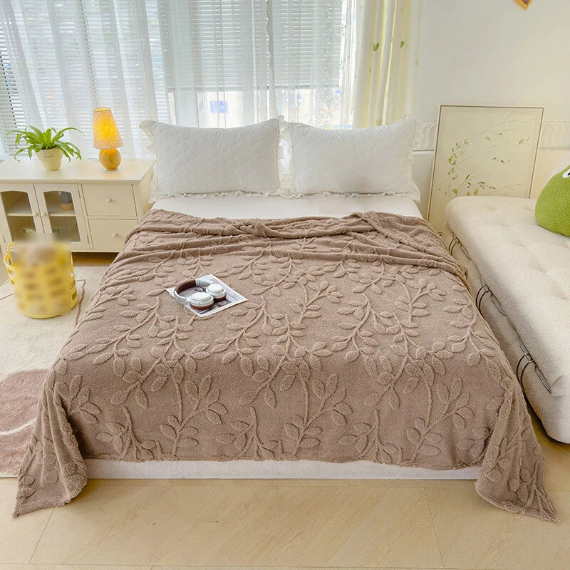 Floral Embossed Fleece Blanket.